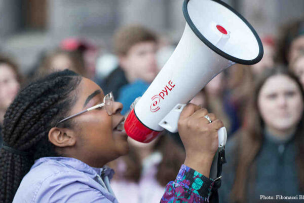 UsingAMegaphoneAtAProtest_1200-675_0.jpg