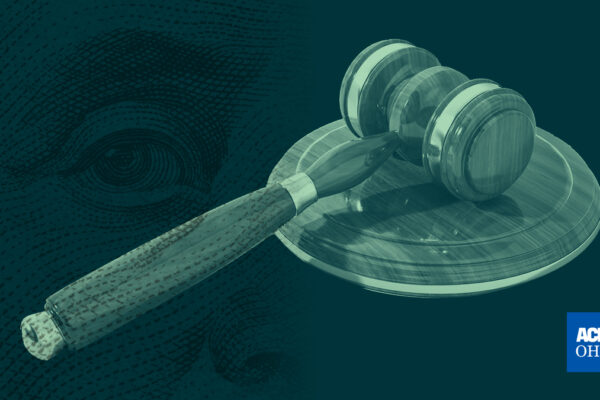Money overlaid on a gavel
