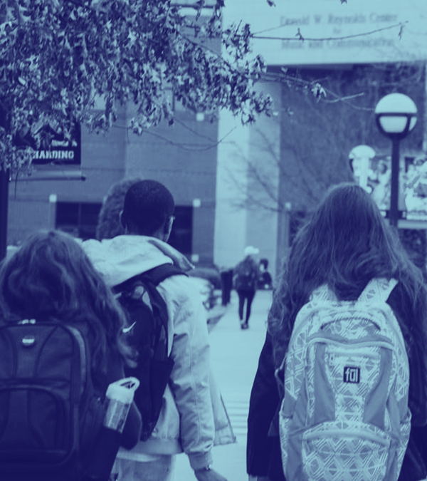 StudentsWalkingToSchoolWearingBackpacks_1200-675.png