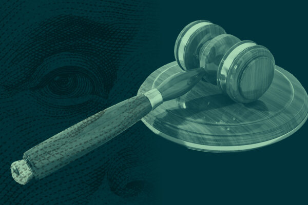 Dark green Ben Franklin's face from the 100 dollar bill overlaid on a green gavel