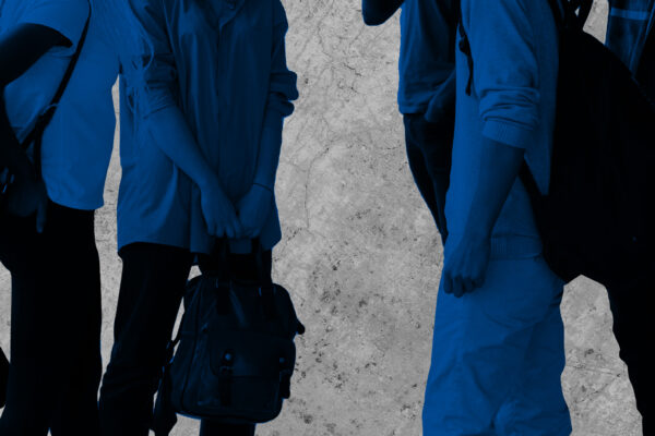 Students standing around talking with black and blue color overlay