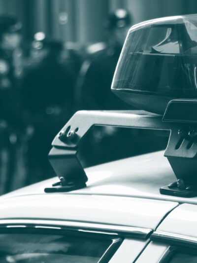 Know Your Rights with a police car with a green color overlay