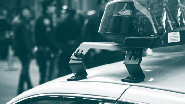 Know Your Rights with a police car with a green color overlay