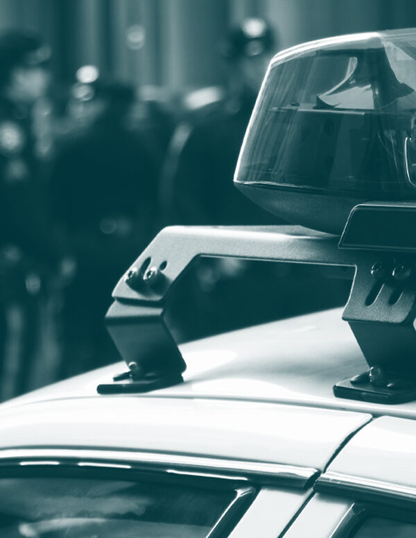 Know Your Rights with a police car with a green color overlay