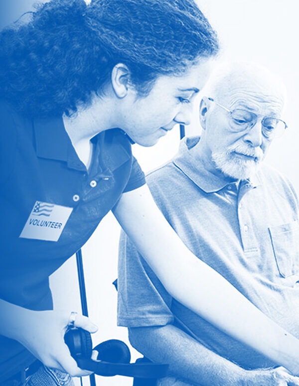 Volunteer assisting a voter with a blue and white color overlay