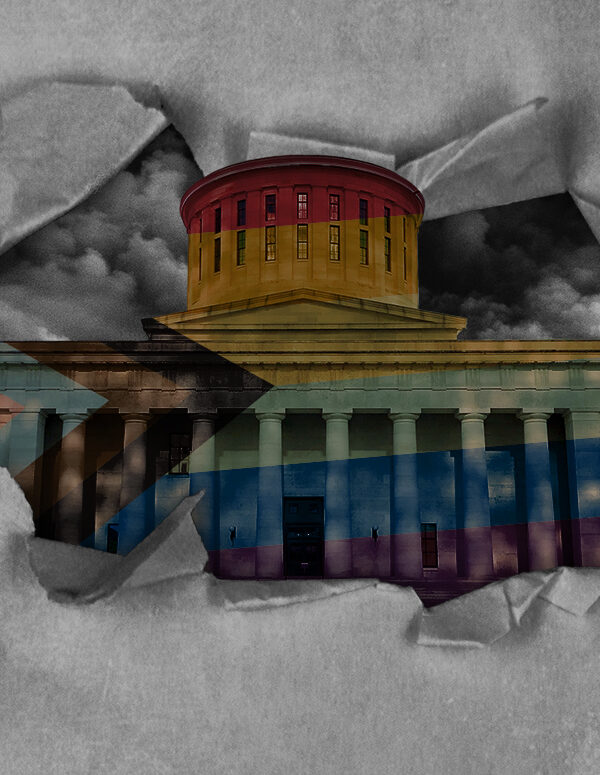 Ohio Statehouse with a pride flag overlay, with dark clouds in the sky, and tearing through paper