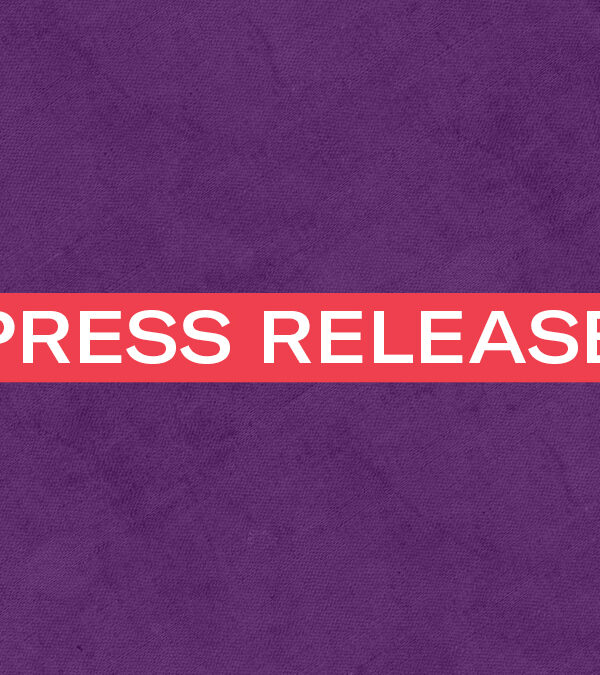 The words 'Press Release' in white letters in a red rectangle on a textured purple background