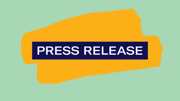 The words 'Press Release' in white in a navy rectangle with an orange highlight mark on a green background