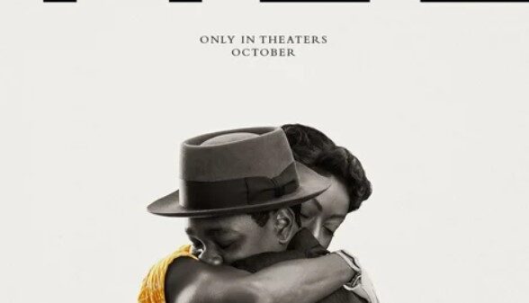 Poster of the movie "Till" with actors playing Emmett Till and Mamie Till-Mobley embracing