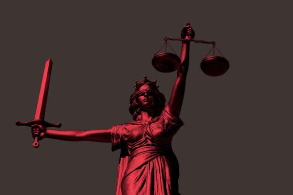 Lady Justice with a red color overlay on a grey background
