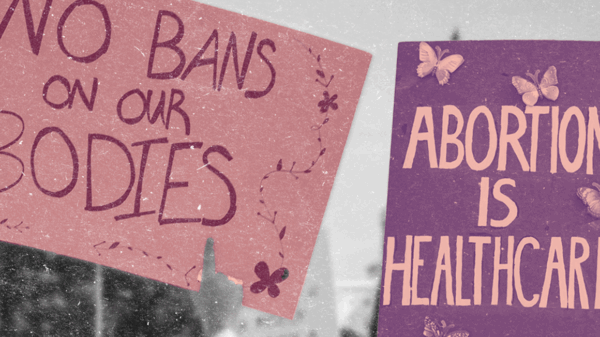 Protest signs reading "No Bans on our Bodies" and "Abortion is Healthcare"