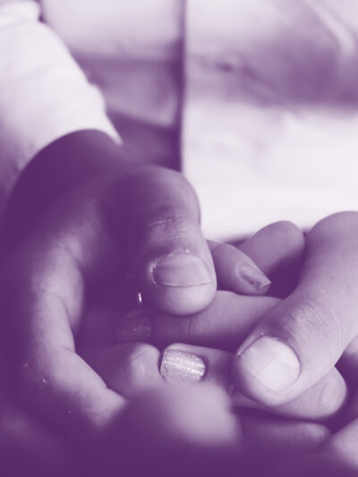 Purple image of holding hands