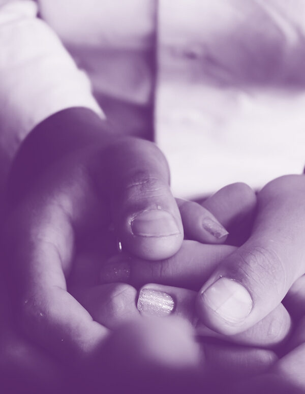 Purple image of holding hands