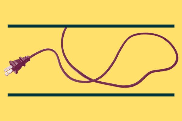 Maroon electrical plug and cord on a yellow backgound