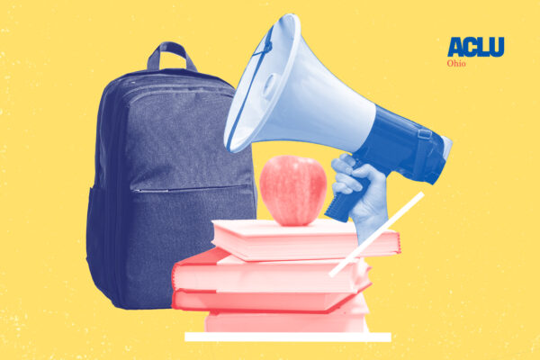 Image of a bullhorn, backpack, schoolbooks, and an apple