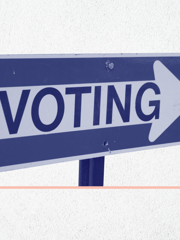 Navy and white 'voting' sign on a white background