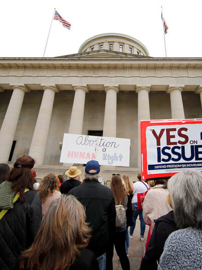 statehouse with yes on issue 1 sign