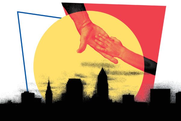 Hands reaching for each other over Cleveland skyline