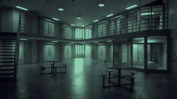 Grainy Green and Black Photo of prison interior