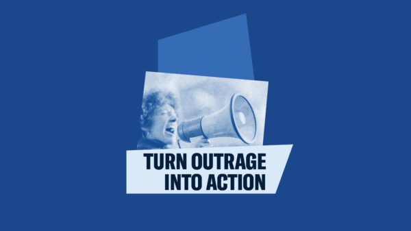 Turn outrage into action photo of woman speaking into a megaphone on a blue background