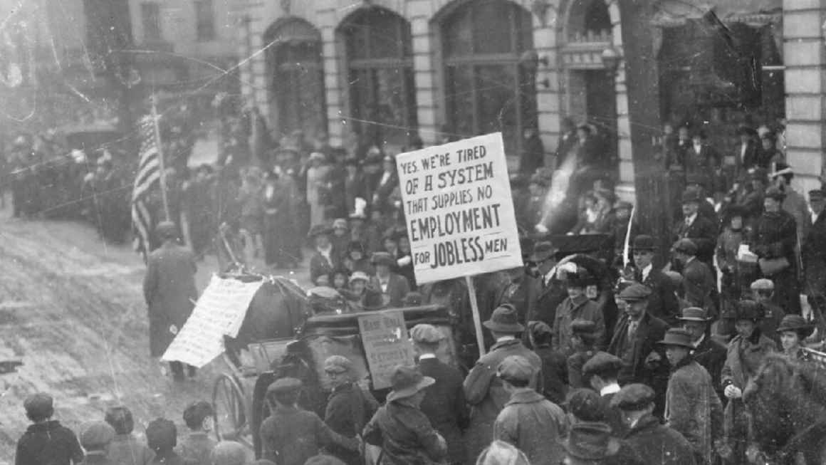 Coxey's Army Protest steps off in Massillon, Ohio. Sign: Yes, we're tired of a system that supplies no employment for jobless men