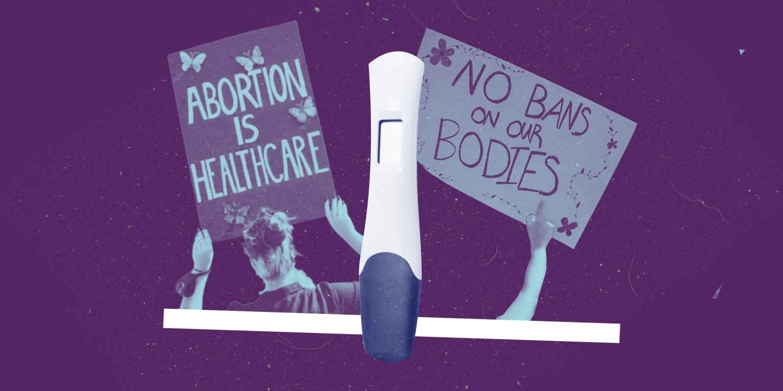 Two pro-abortion protest signs and a pregnancy test