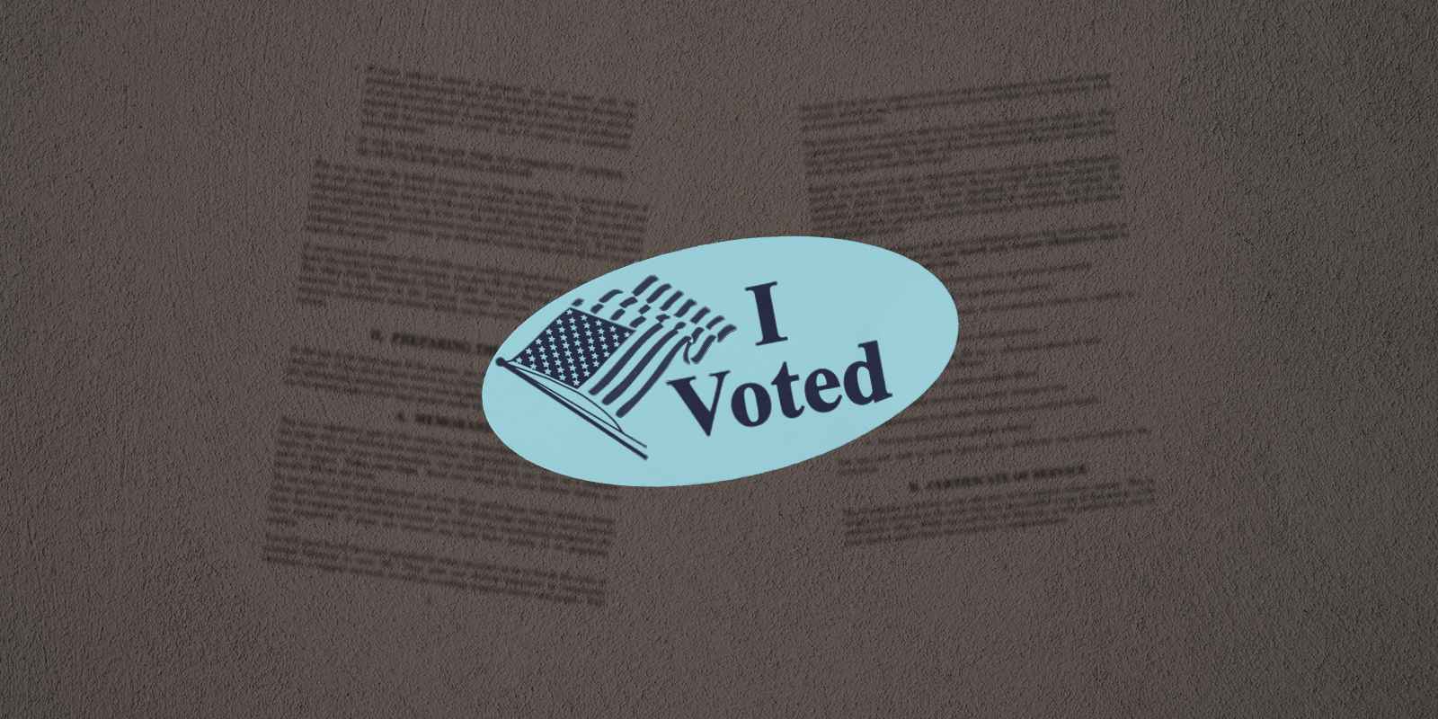 An 'I Voted' sticker on a textured grey background