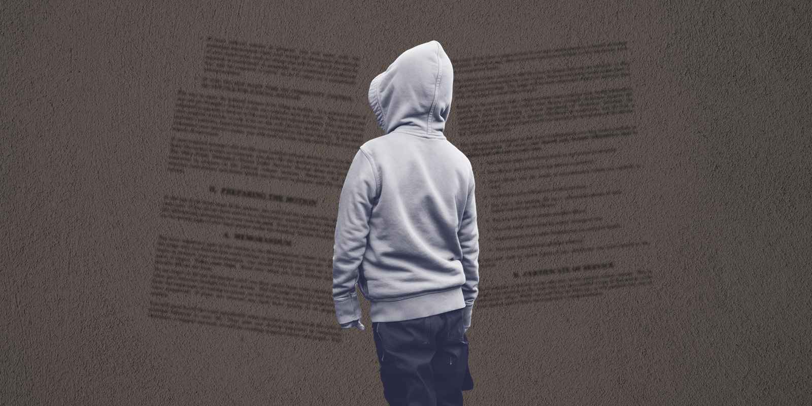 A child, standing in a hooded sweatshirt, facing away, on a textured grey background