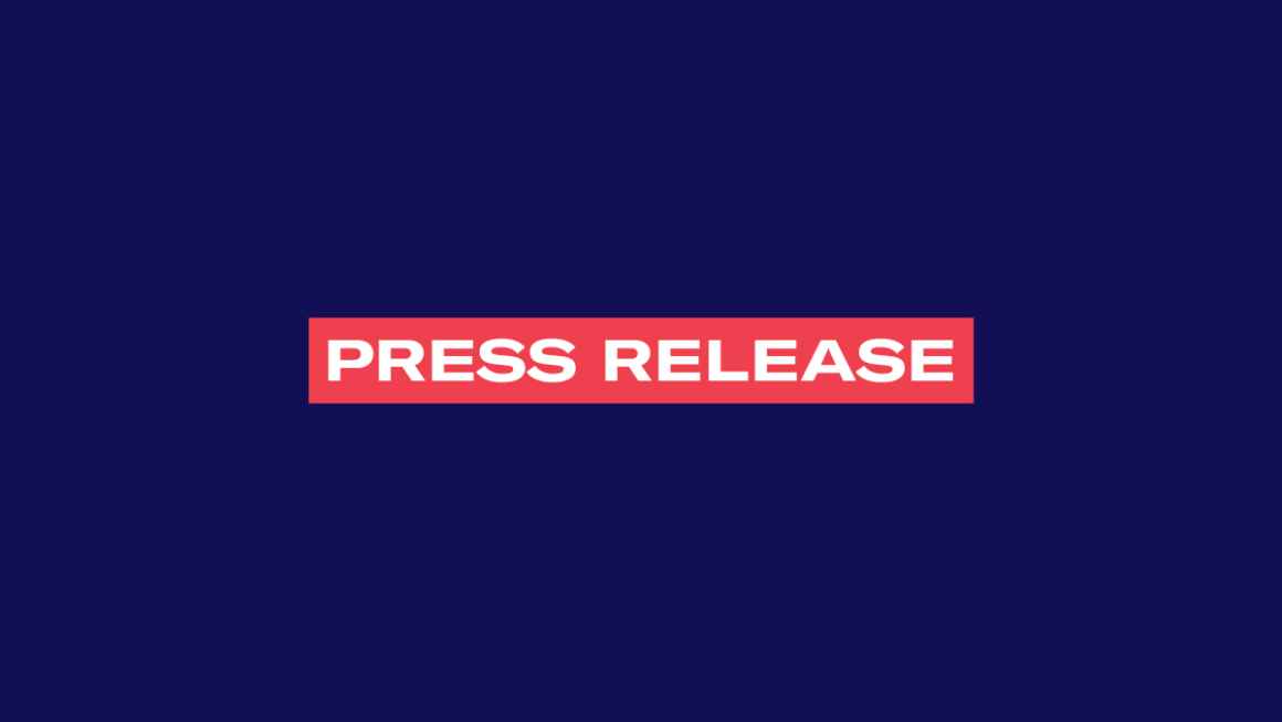 The words 'Press Release' in white font in a red rectangle on a navy background