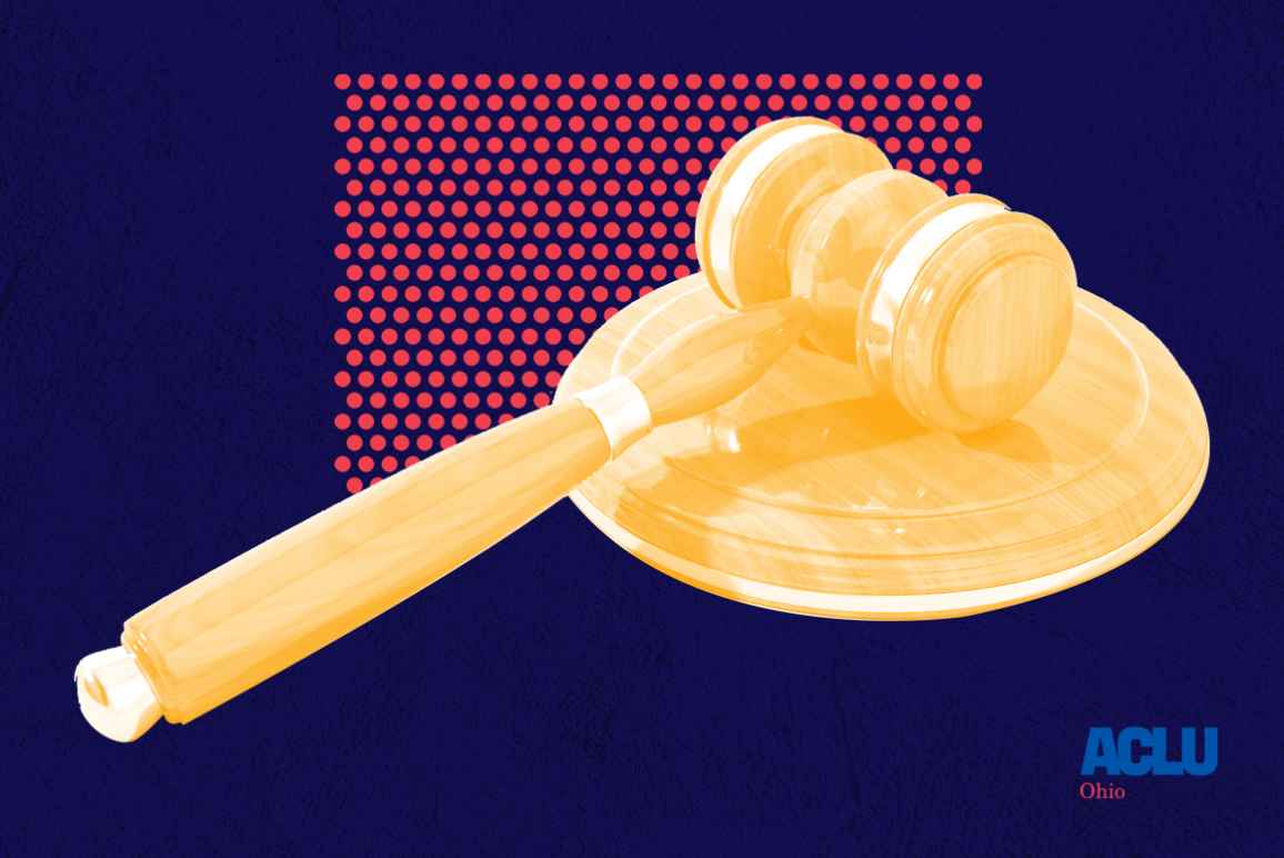 Gavel laying on its side with an orange color overlay on a red dot pattern on a textured navy background