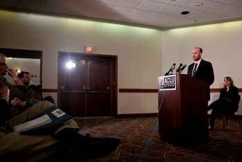 Mike Brickner speaking with reporters