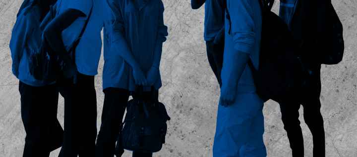 Students standing around talking with black and blue color overlay