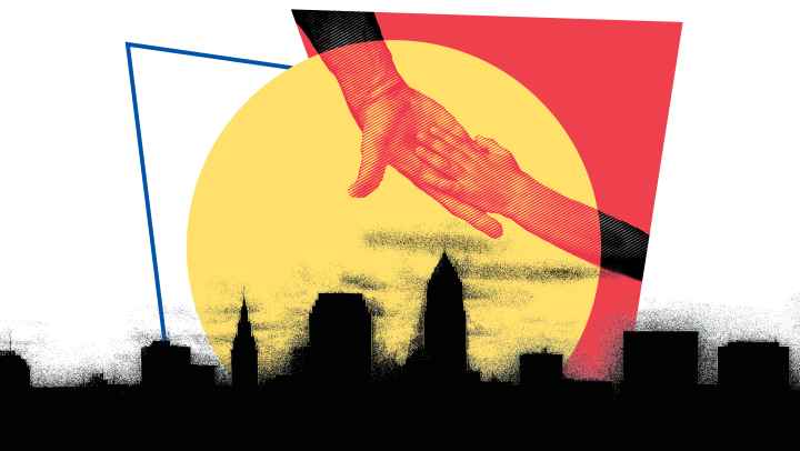 Hands reaching for each other over Cleveland skyline