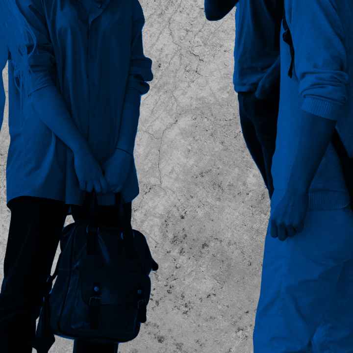 Students standing around talking with black and blue color overlay