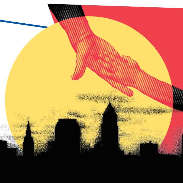 Hands reaching for each other over Cleveland skyline